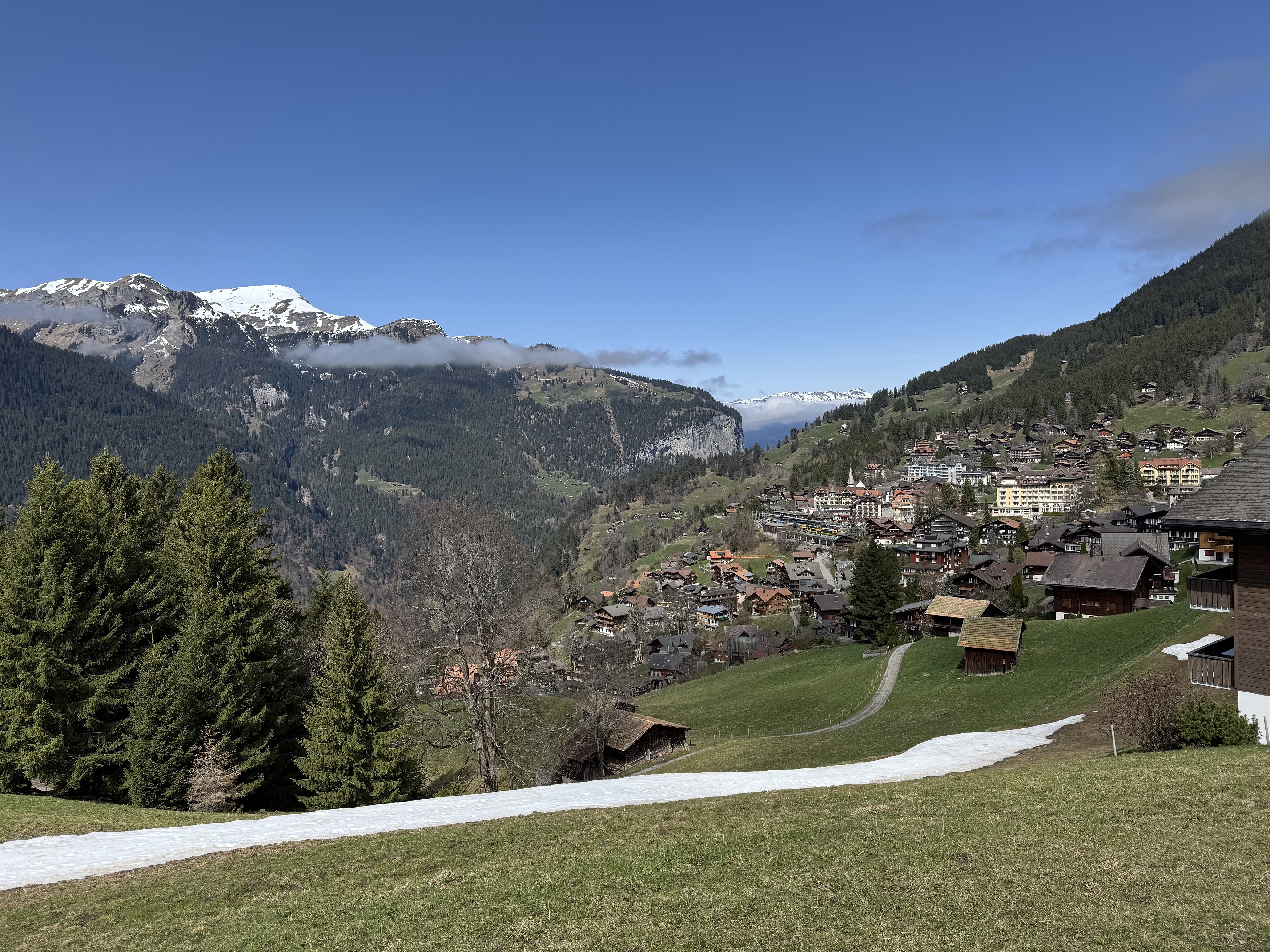 The village of Wengen sits atop the valley cliffs above Lauterbrunnen